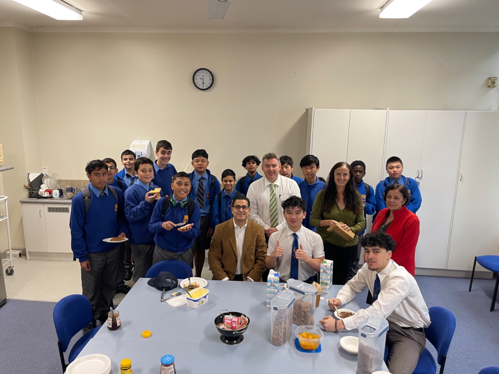 Nathan Tal visiting students and teachers at a local school