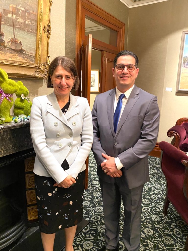 Nathan Tal with a community leader